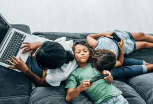 A group of kids enjoying screen time