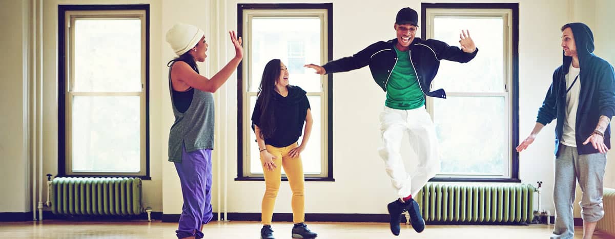 Four people dancing