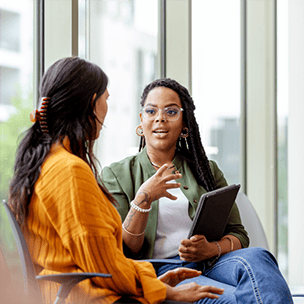 Two women talking