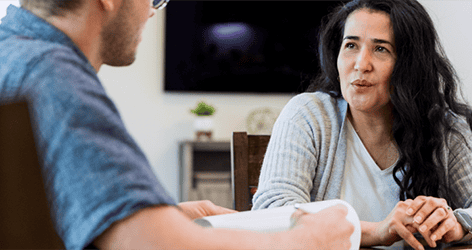 Woman interviewing person