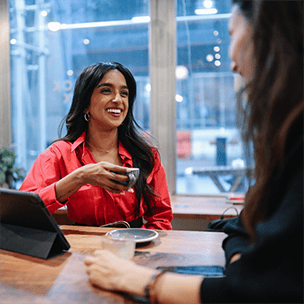 Woman getting coffee at work