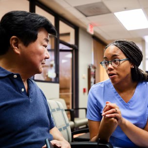 Man at doctor's office with healthcare provider