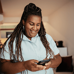 Woman smiling on her phone