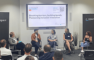 Breaking Barriers - featured image showing the hosts on stage