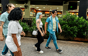 Group of Gen Z walking the streets together