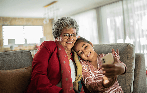 Grandparent with grandchild taking a selfie