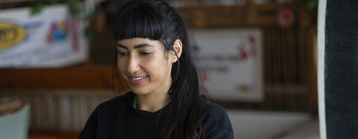 Insight professional working in a coffee shop