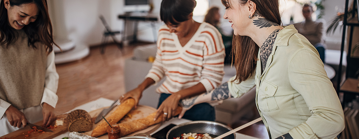 Friends cooking together