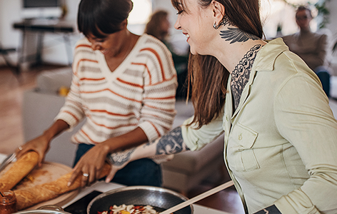 Friends cooking together